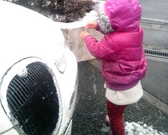 Snow piled on the car.
