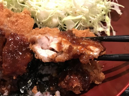Bowl of rice topped with miso sauce pork cutlet and Shredded cabbage at ootoya