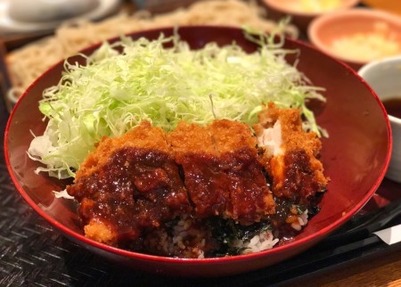 Bowl of rice topped with miso sauce pork cutlet and Shredded cabbage at ootoya