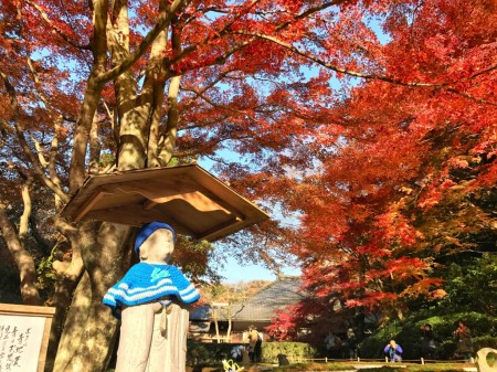Autumn leaves and Jizo statue at inner garden in Meigetsuin in Kamakura