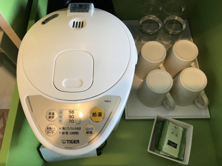 Electric kettle, cups and tea bags in the room of Mitsui Garden Hotel Prana Tokyo Bay